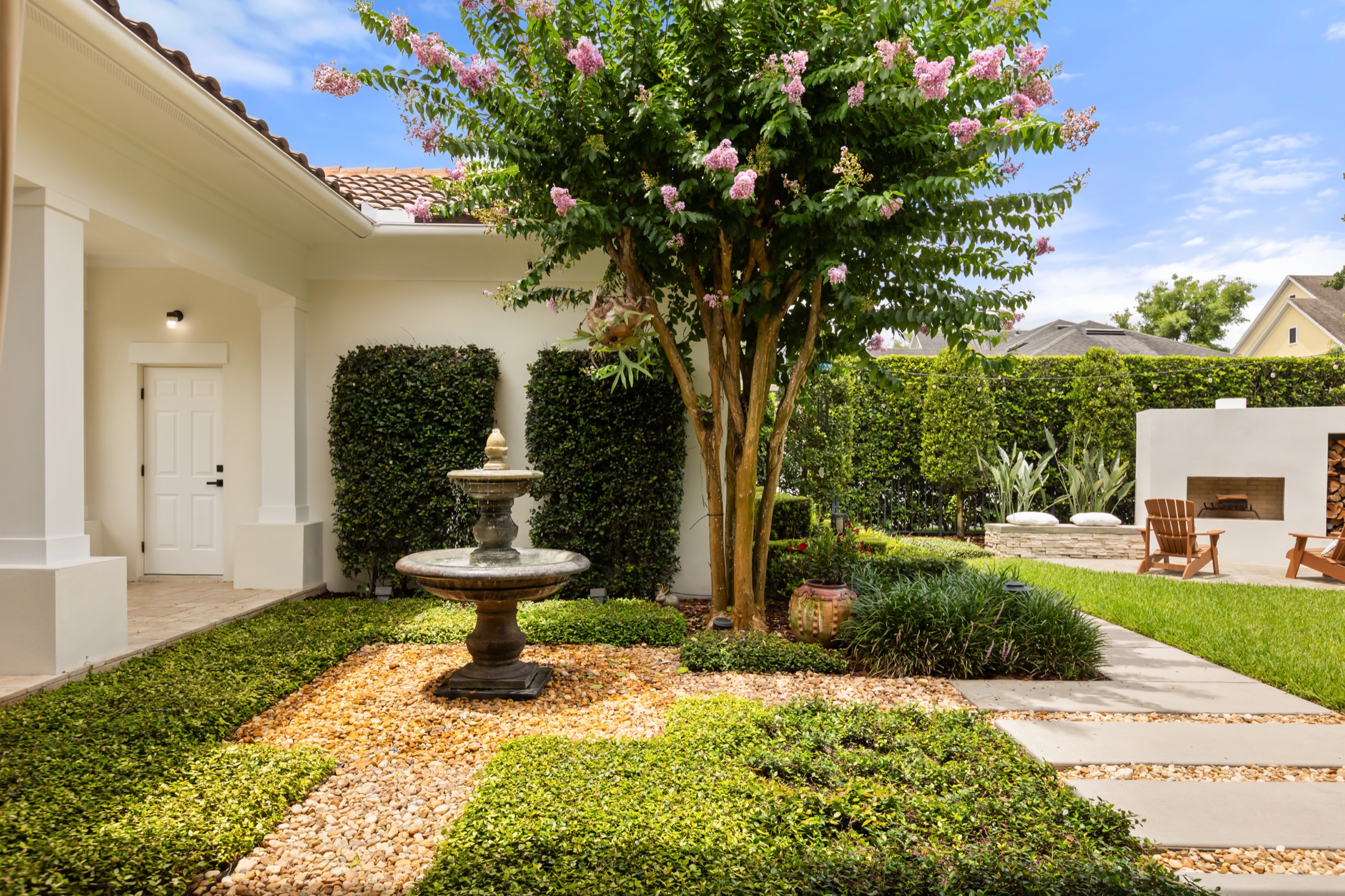 Private courtyard with outdoor fireplace at 2656 Meeting Place