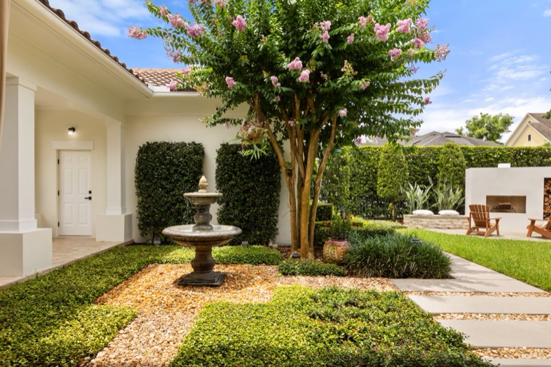 Private courtyard with outdoor fireplace at 2656 Meeting Place